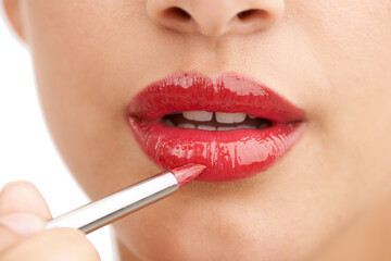 Woman, closeup and red lipstick with makeup for beauty cosmetics on a white studio background. Lips of female person or model applying color, gloss or glow for cosmetology, dermatology or treatment