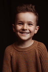 Portrait of a happy smiling stylish white caucasian child boy kid preschooler