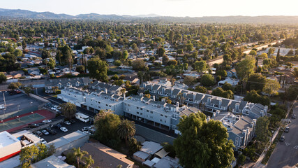 Sunset aerial view of dense housing in the San Fernando valley neighborhood of Canoga Park of Los Angeles, California, USA. © Matt Gush