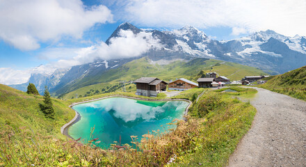 breathtaking tourist destination Bernese Oberland, Kleine Scheidegg station and artificial lake