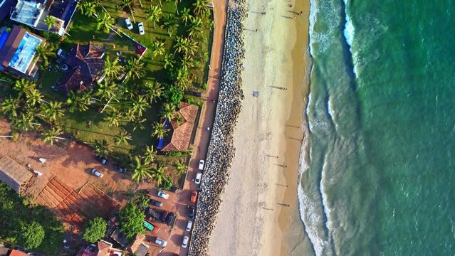 Varkala Long sand beach and calm sea water. South cliff, Varkala, Kerala. South India.