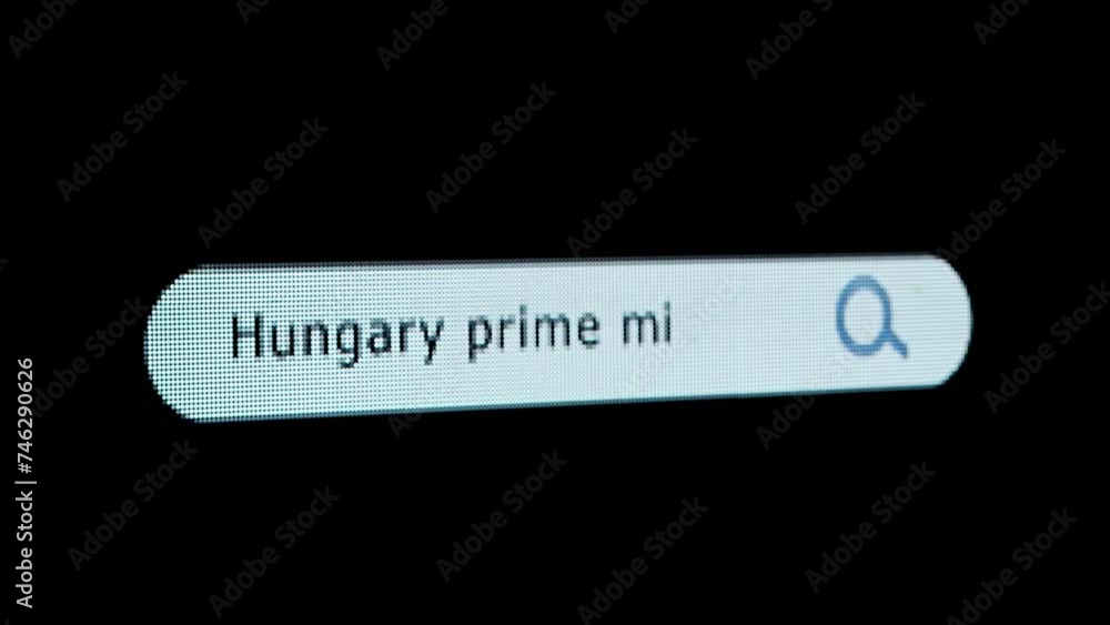 Poster shot of monitor screen. pixel screen with animated search bar, keywords hungary prime minister typed