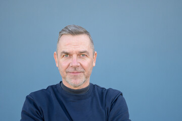 Obraz premium Close up portrait of a middle aged man looking doubtfully or scared