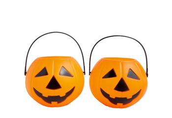 Floating Halloween Jack o Lantern pumpkin bucket, plastic pumpkin isolated on white background with clipping path. Scary halloween's