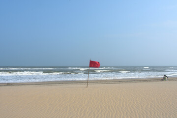 Red flag on the beach denotes that area is in danger.