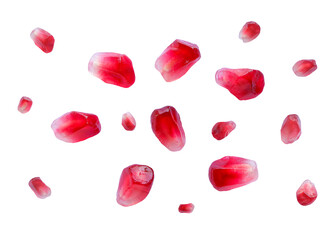 Falling pomegranate seeds isolated on white background.pomegranate seeds fall.