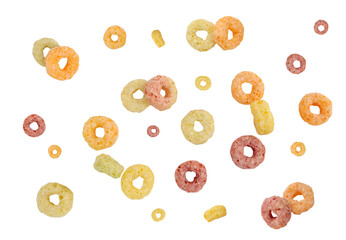 Falling colorful corn rings isolated on white background with clipping path.