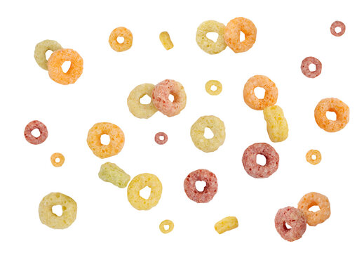 Falling colorful corn rings isolated on white background with clipping path.