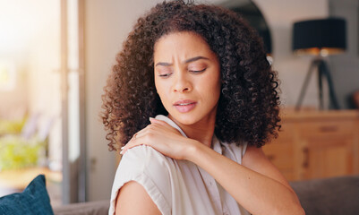 Woman, shoulder pain and injury in home with stress, thinking and hand for massage for relief. Girl, person and burnout with muscle, strain or arthritis with ideas, rub or sad in morning at apartment