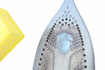 Burnt dirty electric flat iron. Clean an base surface with Toothpaste, sponge. burnt iron for...