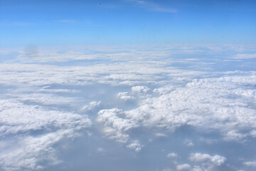 View of clouds from airplane window.