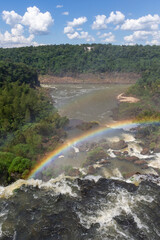 Beautiful view to rainbow, waterfalls and green rainforest
