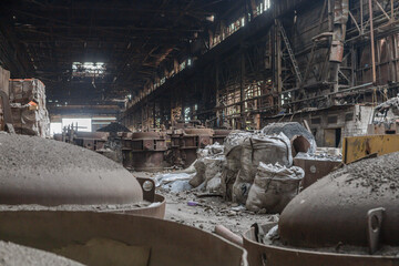 Destroyed workshop of cast iron plant during war in Ukraine.