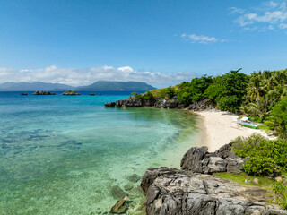 Fototapeta na wymiar Tropical landscape of white beach in Cobrador Island. Romblon, Philippines.