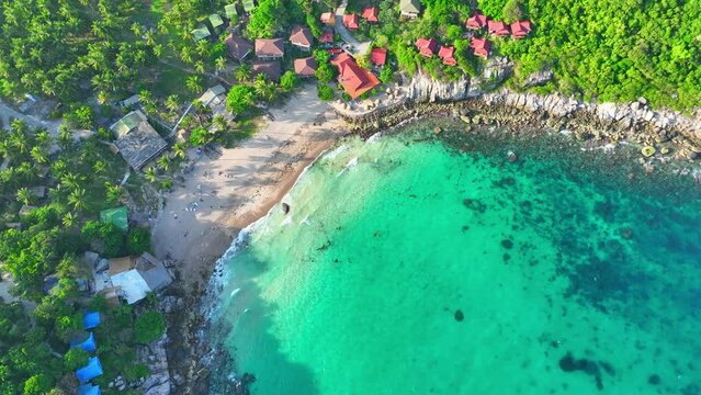 Jewel of the Gulf. Where azure waters meet golden sands, offering adventure seekers and beach lovers an idyllic retreat. Flight over the sea. Stock footage. Koh Tao, Surat Thani, Southern Thailand.
