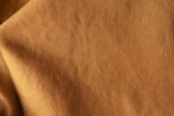 Brown Knit polyester fabric or Polyethylene terephthalate cloth material texture background
