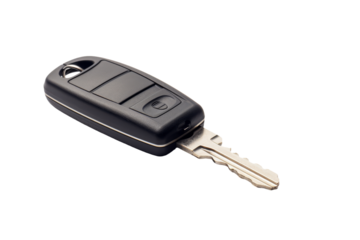 Car Key. A car key is silver and shows the typical design with the logo of the car brand. The background is plain, highlighting the keys details. On PNG Transparent Clear Background.