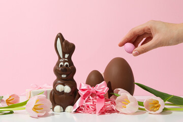 Chocolate bunny with fresh flowers and gifts