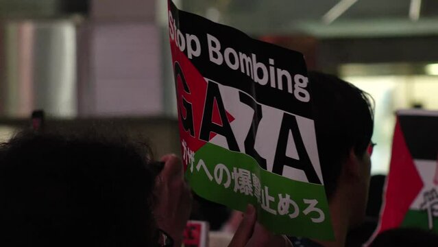 SHIBUYA, TOKYO, JAPAN - 10 DECEMBER 2023 : Pro-Palestine demonstration in Shibuya. Protesters in Japan demand end to Israeli strikes in Gaza.