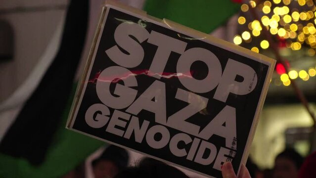 SHIBUYA, TOKYO, JAPAN - 10 DECEMBER 2023 : Pro-Palestine demonstration in Shibuya. Protesters in Japan demand end to Israeli strikes in Gaza.