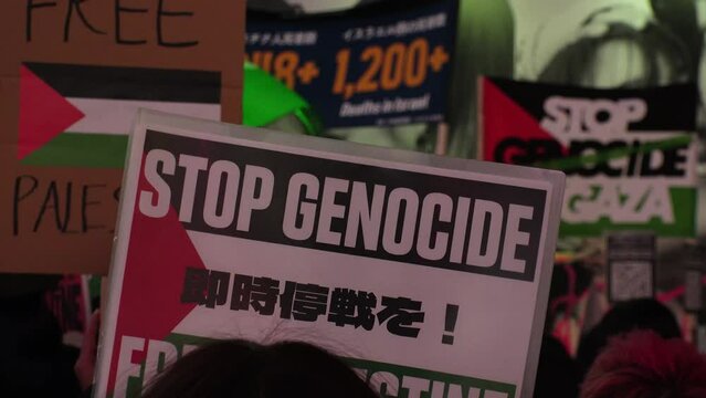 SHIBUYA, TOKYO, JAPAN - 10 DECEMBER 2023 : Pro-Palestine demonstration in Shibuya. Protesters in Japan demand end to Israeli strikes in Gaza.