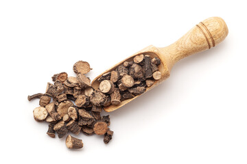 Top view of a wooden scoop filled with Organic Golden eye grass or Black Musli (Curculigo orchioides) herb. Isolated on a white background.