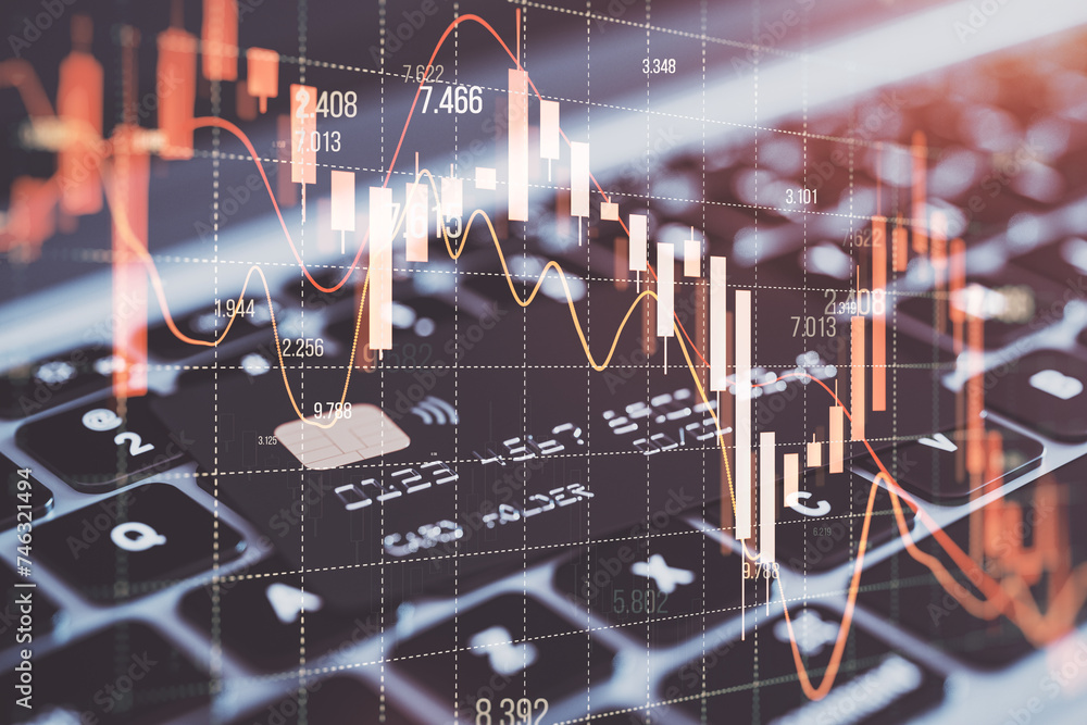 Poster close up of laptop keyboard with bank card and falling red forex candlestick chart on blurry backgro