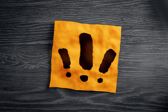 Close up of orange notes with exclamation marks on wooden desk. Questions and answers concept. 3D Rendering. - Powered by Adobe