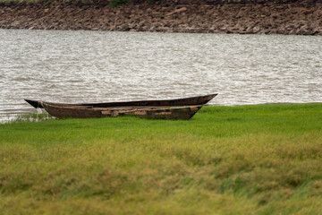 Lake and boat near Tamale, Ghana