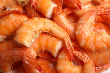 Pile of delicious cooked shrimps as background, closeup