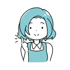 指をさして提案するエプロンの女性