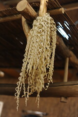 Inau or inaw a wooden ritual wood-shaving stick used by Ainu people for prayers to kamuy gods in...
