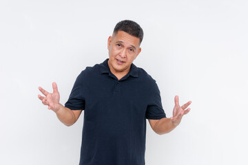 Confident middle-aged male educator making wide hand gestures while giving a clear explanation, isolated on a white background.