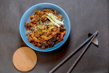 chopsticks and bowl of rice