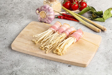 Raw Enoki mushroom with bacon