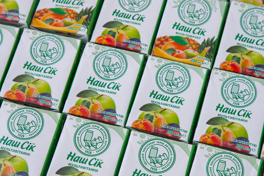 Children's juice in a tetra pack Nash Sik -Our juice. Odesa baby food factory logo. Drink in a box with a straw. Ukraine, Kyiv - January 16, 2024.