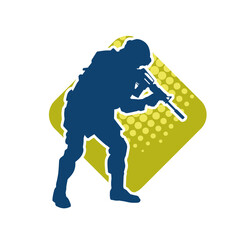 Silhouette of a male soldier carrying machine gun weapon.