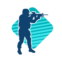 Silhouette of a male soldier carrying machine gun weapon.
