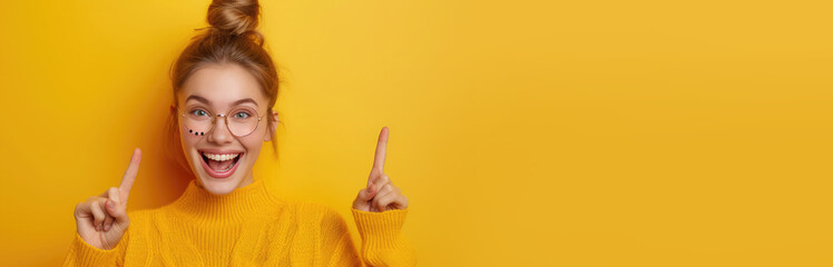 Surprised, shocking, excited young woman with her mouth open on a yellow background. ?opy space for text.Banner - obrazy, fototapety, plakaty