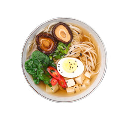 Delicious vegetarian ramen with egg, mushrooms, tofu and vegetables in bowl isolated on white, top view. Noodle soup