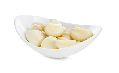 Peeled garlic cloves in bowl isolated on white