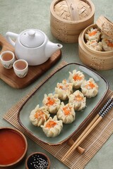 Very soft and tasty chicken dimsum served with spicy and sour sauce