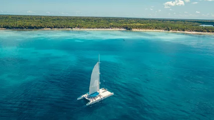 Foto op Plexiglas Boat in the caribbean sea with tropical water in dominican republic on paradise  © Pedro