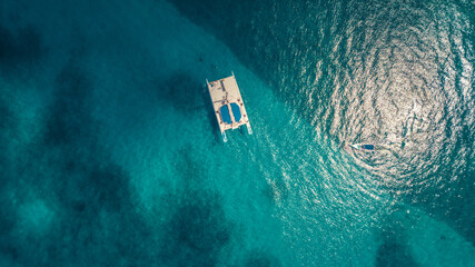 Boat in the caribbean sea with tropical water in dominican republic on paradise 