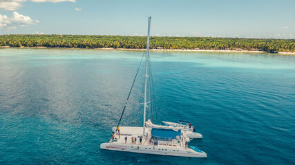 Boat in the caribbean sea with tropical water in dominican republic on paradise 