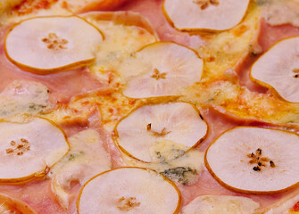 pizza with pear and gorgonzola top view