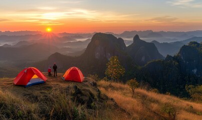 a serene morning scene with two tents set up on a mountain peak, as a person stands between them, gazing at the sunrise over a range of misty mountains and valleys. - Powered by Adobe