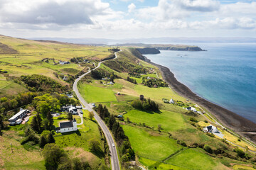 Aerial view of coastal village road in Scotland