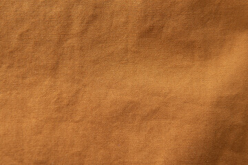 Brown Knit polyester fabric or Polyethylene terephthalate cloth material texture background