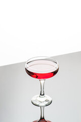 transparent berry cocktail with a drop